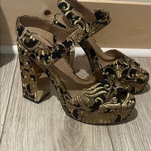 Tory Burch Black and Gold Baroque Platform Sandals